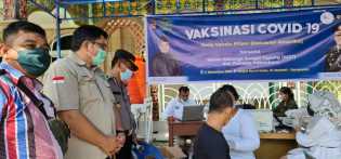 Ikatan Keluarga Sungai Tapung (IKST) Gandeng Polresta Pekanbaru Gelar Kegiatan Vaksinasi